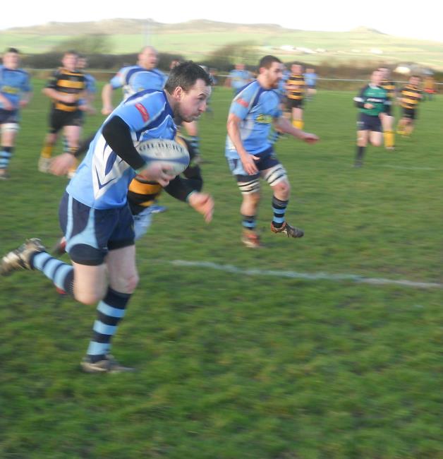 Will Davies on his way to the game’s opening try